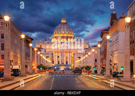 Rome, Vatican City. Cityscape image of illuminated Saint Peter`s Basilica and Street Via della Conciliazione, Vatican City, Rome, Italy. Stock Photo